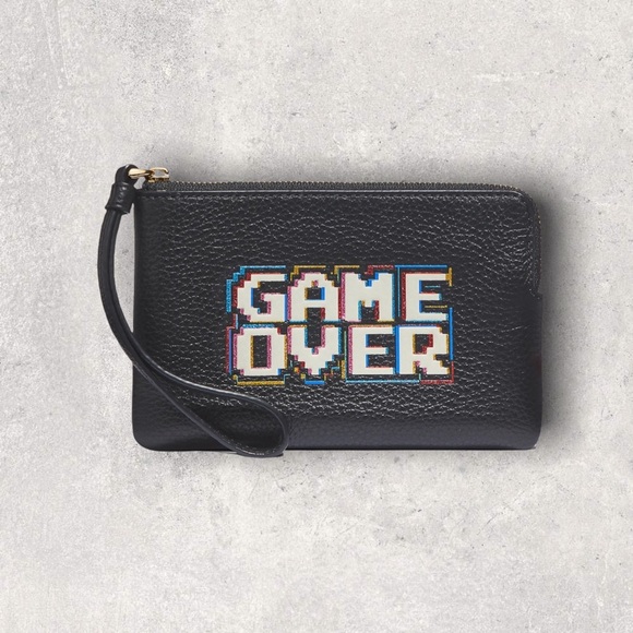 Coach Handbags - COACH Corner Zip Wristlet With Pac Man Game Over